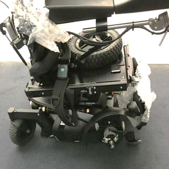Photo of powered wheelchair severely damaged from air travel