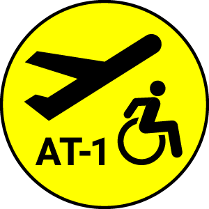 Symbol representing compliance with RESNA AT-1. Aircraft symbol taking off over AT-1 and a person using a wheelchair.