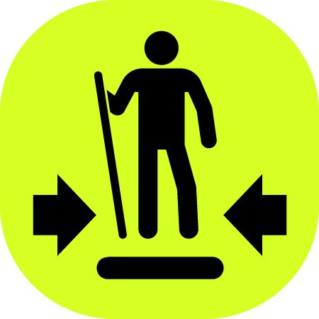 Tread width symbol showing hiker between two arrows indicating width